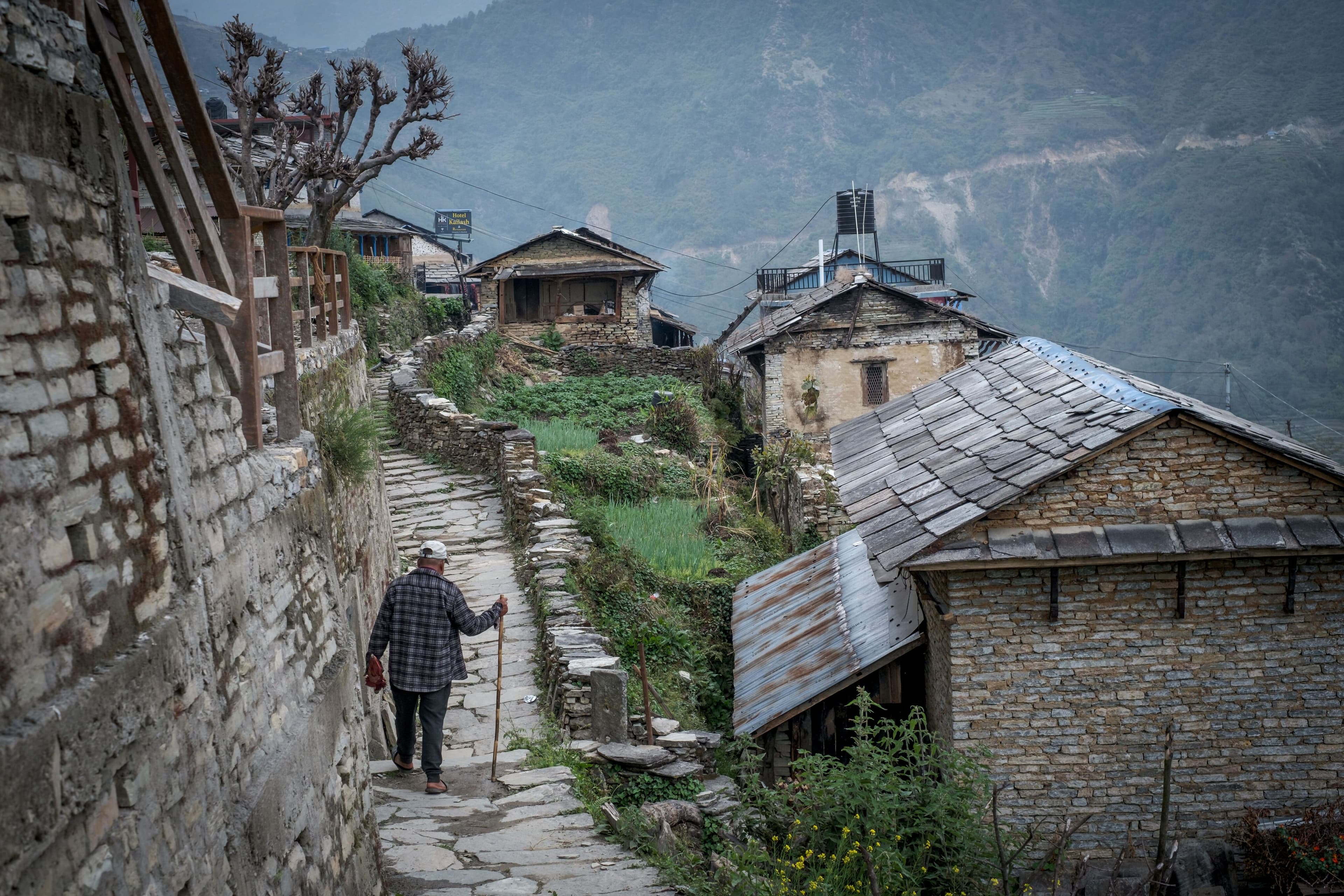 man walking with stick